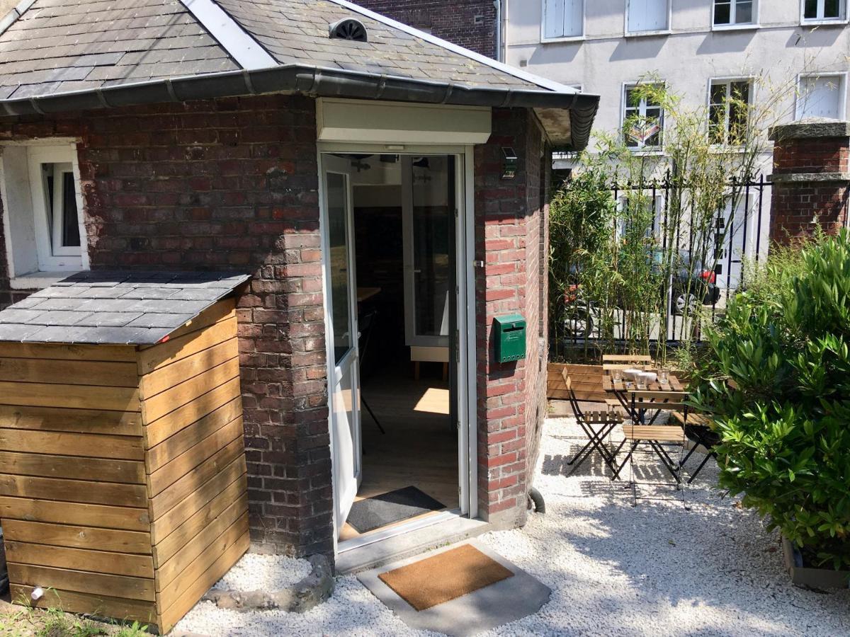 La Cabane Urbaine Et Son Jardin Ruan Exterior foto
